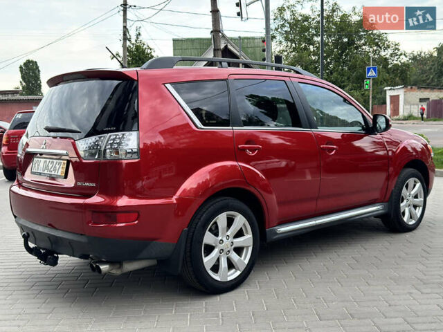 Красный Мицубиси Аутлендер ХЛ, объемом двигателя 2.2 л и пробегом 188 тыс. км за 10550 $, фото 3 на Automoto.ua