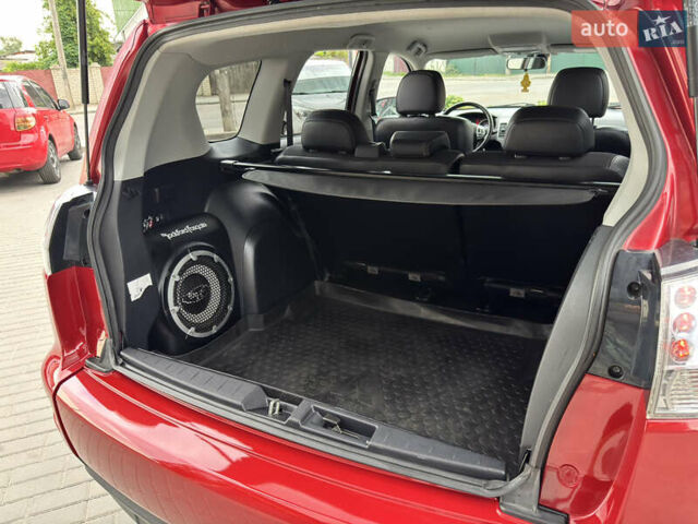 Красный Мицубиси Аутлендер ХЛ, объемом двигателя 2.2 л и пробегом 188 тыс. км за 10550 $, фото 24 на Automoto.ua