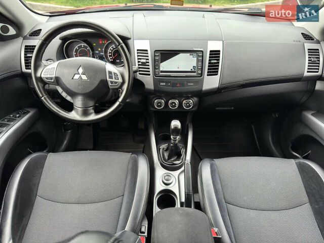Красный Мицубиси Аутлендер ХЛ, объемом двигателя 2.2 л и пробегом 188 тыс. км за 10550 $, фото 18 на Automoto.ua