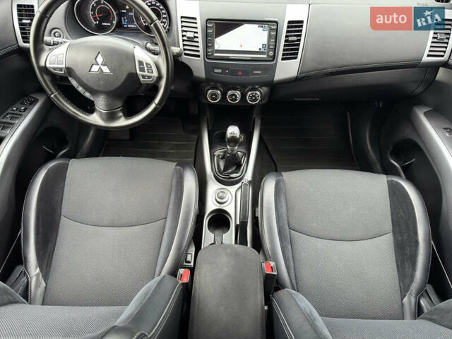 Красный Мицубиси Аутлендер ХЛ, объемом двигателя 2.2 л и пробегом 188 тыс. км за 10550 $, фото 11 на Automoto.ua