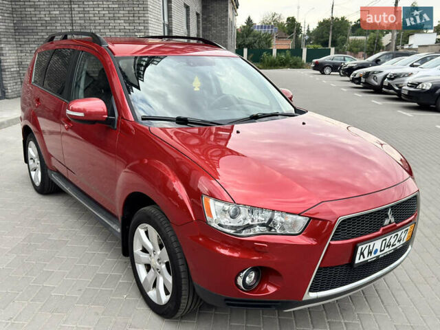 Красный Мицубиси Аутлендер ХЛ, объемом двигателя 2.2 л и пробегом 188 тыс. км за 10550 $, фото 5 на Automoto.ua