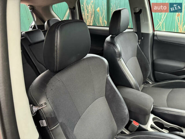 Красный Мицубиси Аутлендер ХЛ, объемом двигателя 2.2 л и пробегом 227 тыс. км за 11999 $, фото 50 на Automoto.ua