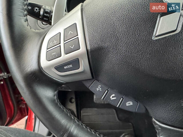 Красный Мицубиси Аутлендер ХЛ, объемом двигателя 2.2 л и пробегом 227 тыс. км за 11999 $, фото 24 на Automoto.ua