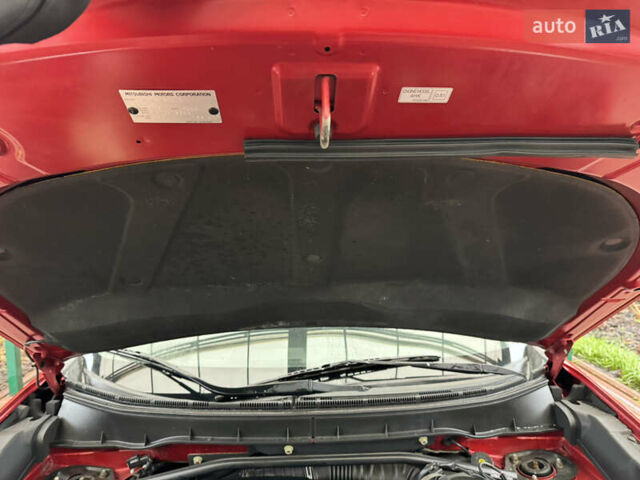 Красный Мицубиси Аутлендер ХЛ, объемом двигателя 2.2 л и пробегом 227 тыс. км за 11999 $, фото 58 на Automoto.ua