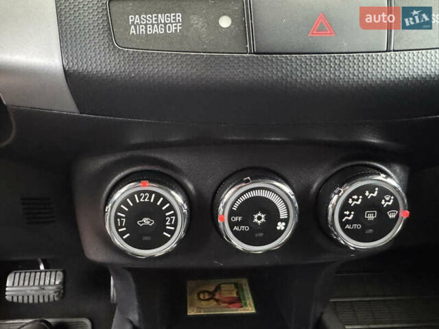 Красный Мицубиси Аутлендер ХЛ, объемом двигателя 2.2 л и пробегом 227 тыс. км за 11999 $, фото 27 на Automoto.ua