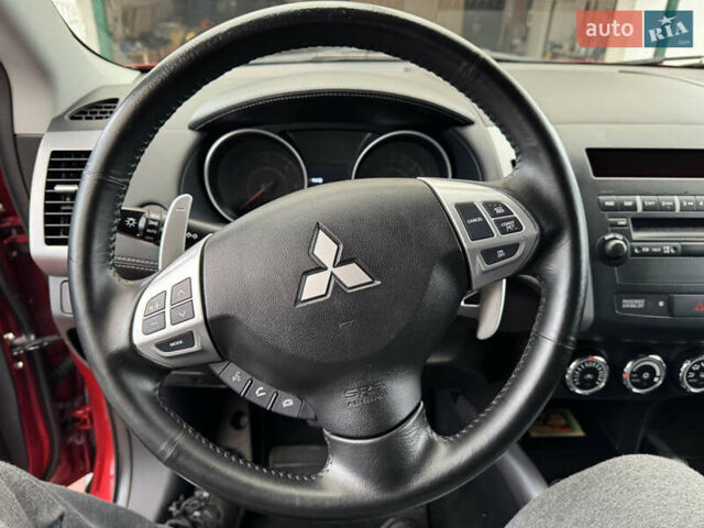Красный Мицубиси Аутлендер ХЛ, объемом двигателя 2.2 л и пробегом 227 тыс. км за 11999 $, фото 22 на Automoto.ua