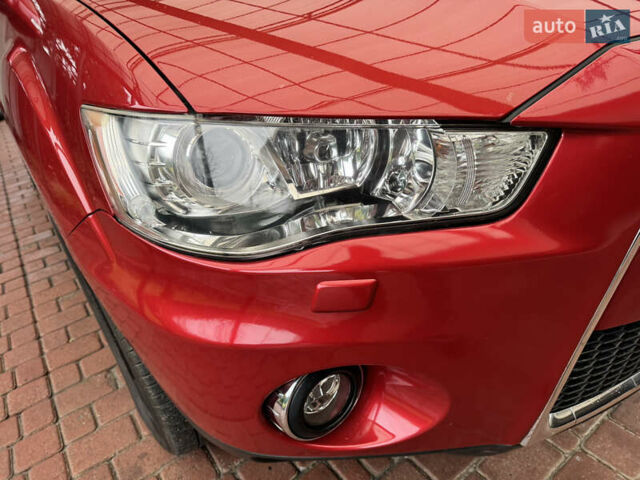 Красный Мицубиси Аутлендер ХЛ, объемом двигателя 2.2 л и пробегом 227 тыс. км за 11999 $, фото 11 на Automoto.ua