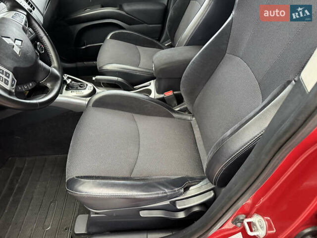 Красный Мицубиси Аутлендер ХЛ, объемом двигателя 2.2 л и пробегом 227 тыс. км за 11999 $, фото 18 на Automoto.ua