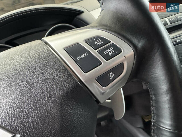 Красный Мицубиси Аутлендер ХЛ, объемом двигателя 2.2 л и пробегом 227 тыс. км за 11999 $, фото 23 на Automoto.ua