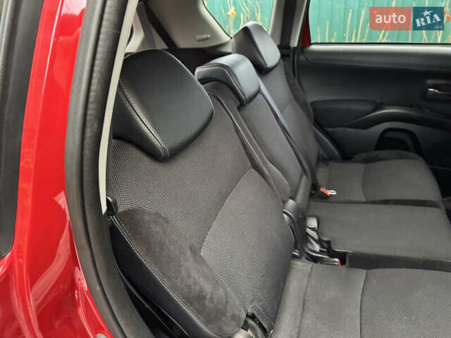 Красный Мицубиси Аутлендер ХЛ, объемом двигателя 2.2 л и пробегом 227 тыс. км за 11999 $, фото 44 на Automoto.ua