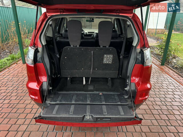 Красный Мицубиси Аутлендер ХЛ, объемом двигателя 2.2 л и пробегом 227 тыс. км за 11999 $, фото 42 на Automoto.ua