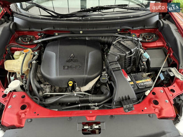 Красный Мицубиси Аутлендер ХЛ, объемом двигателя 2.2 л и пробегом 227 тыс. км за 11999 $, фото 56 на Automoto.ua