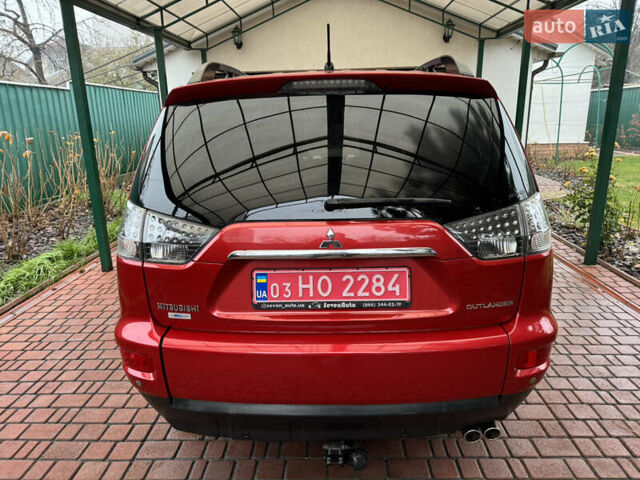 Красный Мицубиси Аутлендер ХЛ, объемом двигателя 2.2 л и пробегом 227 тыс. км за 11999 $, фото 4 на Automoto.ua