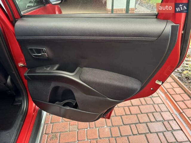 Красный Мицубиси Аутлендер ХЛ, объемом двигателя 2.2 л и пробегом 227 тыс. км за 11999 $, фото 47 на Automoto.ua