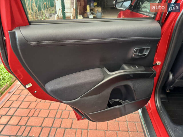 Красный Мицубиси Аутлендер ХЛ, объемом двигателя 2.2 л и пробегом 227 тыс. км за 11999 $, фото 39 на Automoto.ua