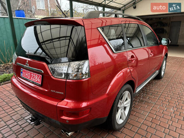 Красный Мицубиси Аутлендер ХЛ, объемом двигателя 2.2 л и пробегом 227 тыс. км за 11999 $, фото 5 на Automoto.ua