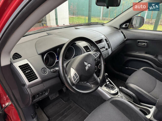 Красный Мицубиси Аутлендер ХЛ, объемом двигателя 2.2 л и пробегом 227 тыс. км за 11999 $, фото 20 на Automoto.ua