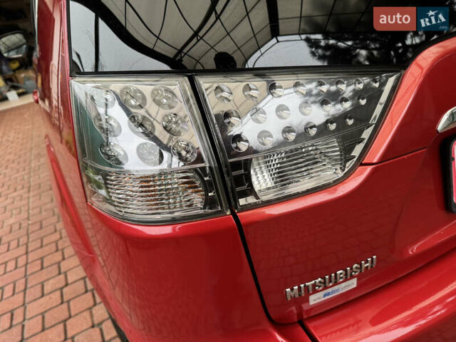 Красный Мицубиси Аутлендер ХЛ, объемом двигателя 2.2 л и пробегом 227 тыс. км за 11999 $, фото 15 на Automoto.ua