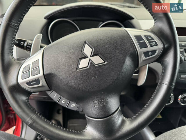 Красный Мицубиси Аутлендер ХЛ, объемом двигателя 2.2 л и пробегом 227 тыс. км за 11999 $, фото 21 на Automoto.ua