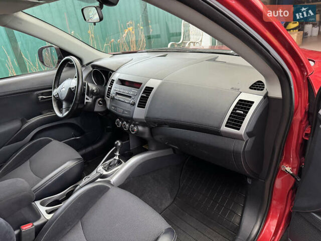 Красный Мицубиси Аутлендер ХЛ, объемом двигателя 2.2 л и пробегом 227 тыс. км за 11999 $, фото 53 на Automoto.ua