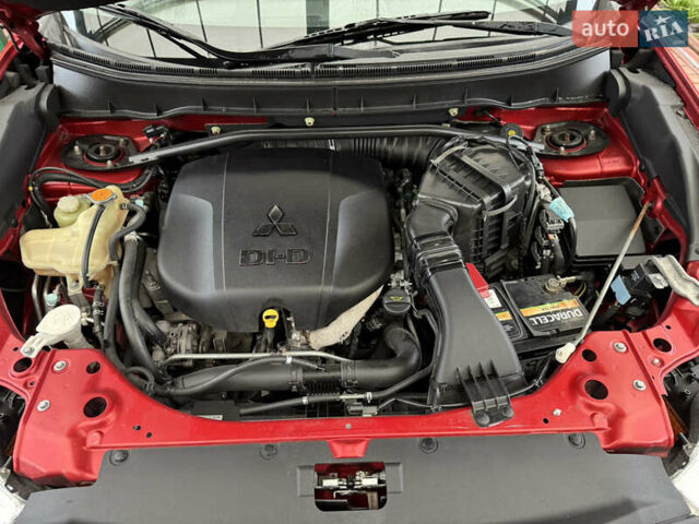 Красный Мицубиси Аутлендер ХЛ, объемом двигателя 2.2 л и пробегом 227 тыс. км за 11999 $, фото 57 на Automoto.ua