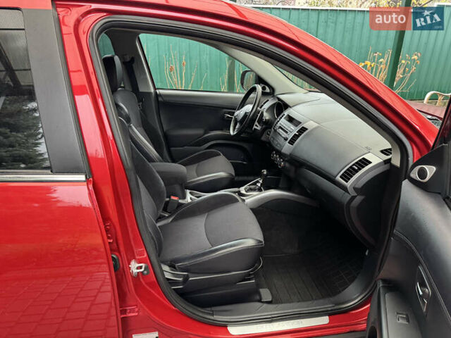 Красный Мицубиси Аутлендер ХЛ, объемом двигателя 2.2 л и пробегом 227 тыс. км за 11999 $, фото 49 на Automoto.ua