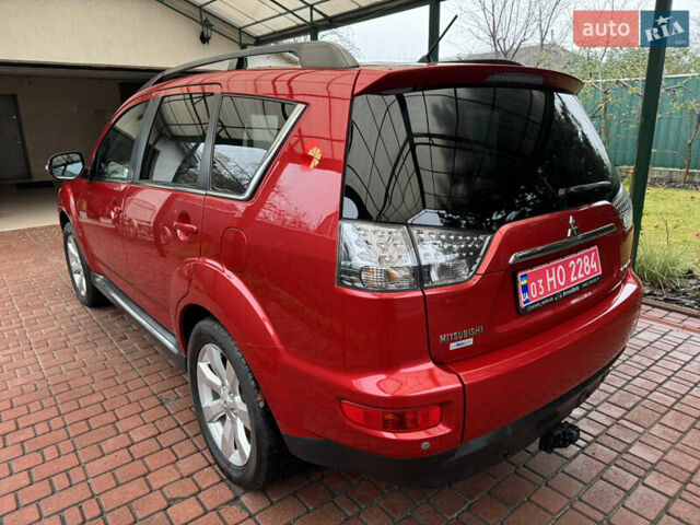 Красный Мицубиси Аутлендер ХЛ, объемом двигателя 2.2 л и пробегом 227 тыс. км за 11999 $, фото 3 на Automoto.ua