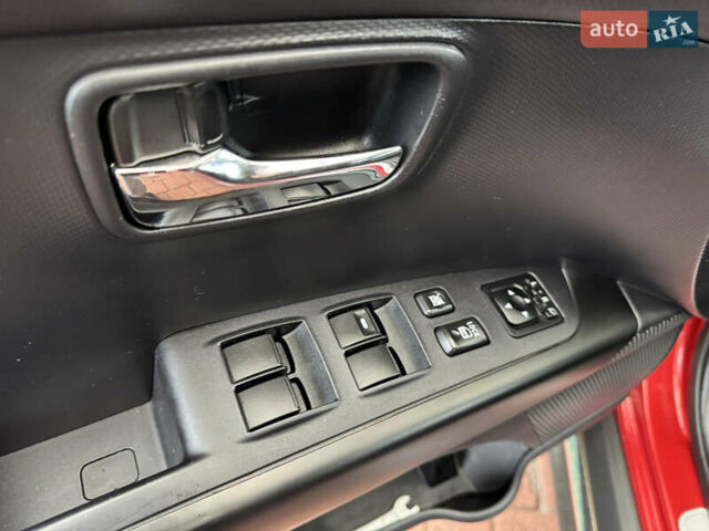 Красный Мицубиси Аутлендер ХЛ, объемом двигателя 2.2 л и пробегом 227 тыс. км за 11999 $, фото 34 на Automoto.ua