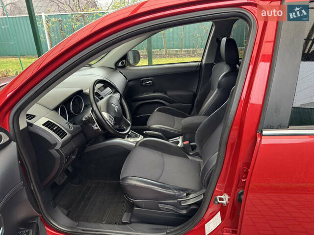 Красный Мицубиси Аутлендер ХЛ, объемом двигателя 2.2 л и пробегом 227 тыс. км за 11999 $, фото 16 на Automoto.ua