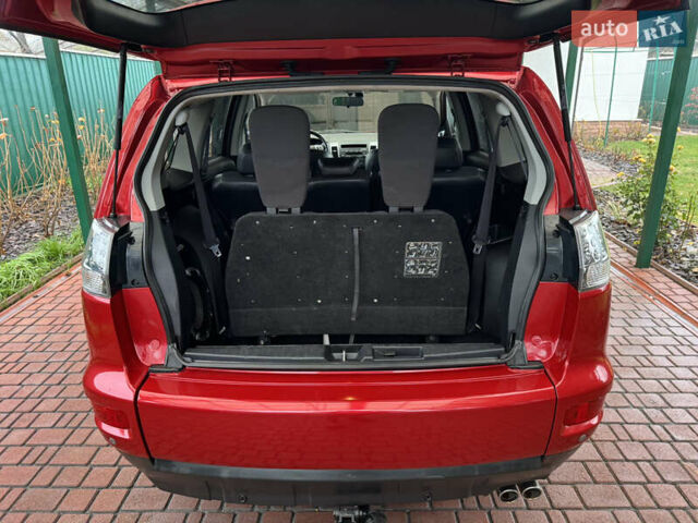 Красный Мицубиси Аутлендер ХЛ, объемом двигателя 2.2 л и пробегом 227 тыс. км за 11999 $, фото 41 на Automoto.ua