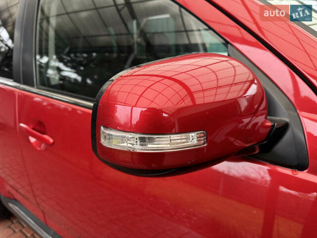 Красный Мицубиси Аутлендер ХЛ, объемом двигателя 2.2 л и пробегом 227 тыс. км за 11999 $, фото 13 на Automoto.ua