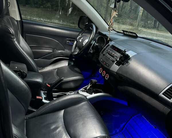 Мицубиси Аутлендер ХЛ, объемом двигателя 2.36 л и пробегом 237 тыс. км за 9000 $, фото 12 на Automoto.ua