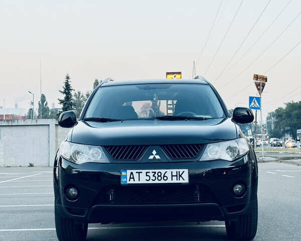 Мицубиси Аутлендер ХЛ, объемом двигателя 2.36 л и пробегом 237 тыс. км за 9000 $, фото 3 на Automoto.ua
