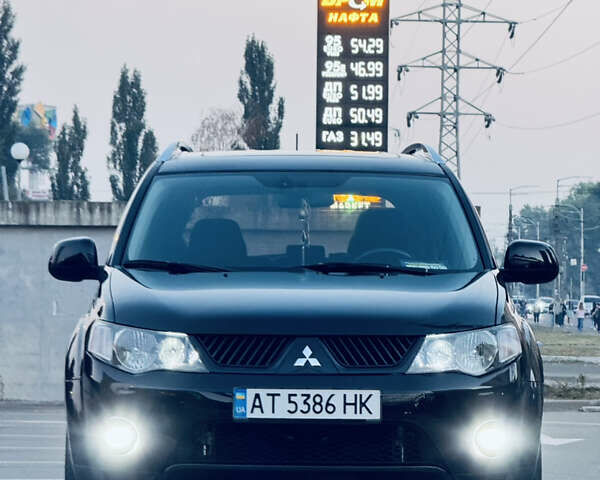 Мицубиси Аутлендер ХЛ, объемом двигателя 2.36 л и пробегом 237 тыс. км за 9000 $, фото 1 на Automoto.ua