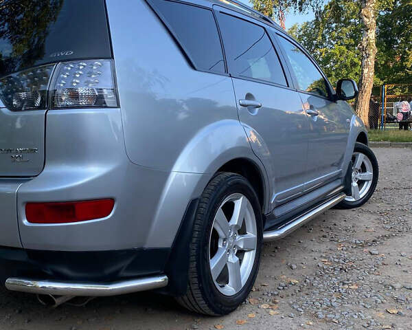 Мицубиси Аутлендер ХЛ, объемом двигателя 2.36 л и пробегом 177 тыс. км за 9200 $, фото 13 на Automoto.ua