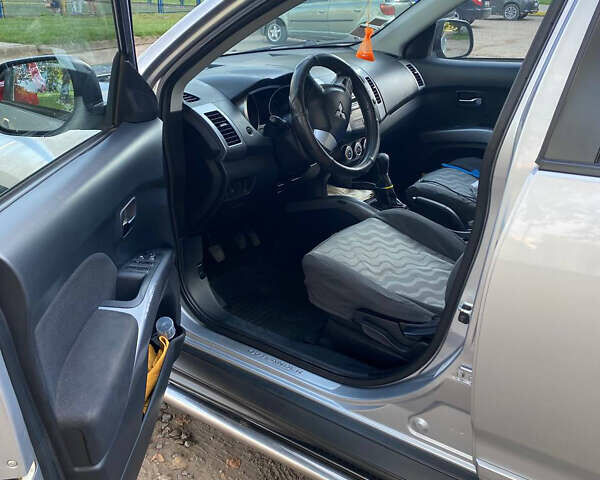 Мицубиси Аутлендер ХЛ, объемом двигателя 2.36 л и пробегом 177 тыс. км за 9200 $, фото 9 на Automoto.ua