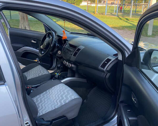 Мицубиси Аутлендер ХЛ, объемом двигателя 2.36 л и пробегом 177 тыс. км за 9200 $, фото 1 на Automoto.ua