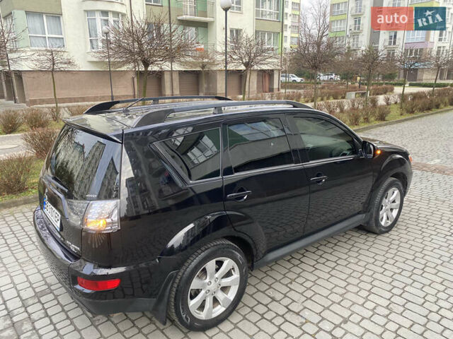 Мицубиси Аутлендер ХЛ, объемом двигателя 2.36 л и пробегом 244 тыс. км за 9999 $, фото 4 на Automoto.ua