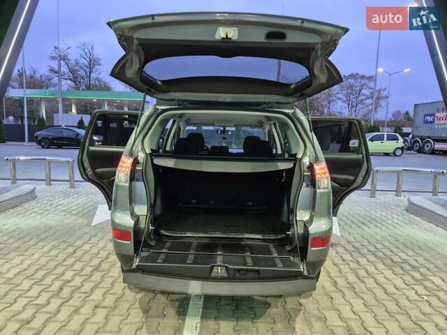 Серый Мицубиси Аутлендер ХЛ, объемом двигателя 2.2 л и пробегом 268 тыс. км за 8999 $, фото 71 на Automoto.ua