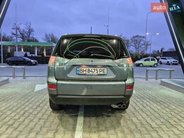 Серый Мицубиси Аутлендер ХЛ, объемом двигателя 2.2 л и пробегом 268 тыс. км за 8999 $, фото 79 на Automoto.ua