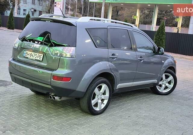 Серый Мицубиси Аутлендер ХЛ, объемом двигателя 2.2 л и пробегом 268 тыс. км за 8999 $, фото 35 на Automoto.ua