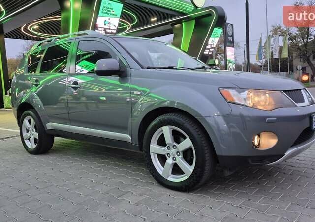 Серый Мицубиси Аутлендер ХЛ, объемом двигателя 2.2 л и пробегом 268 тыс. км за 8999 $, фото 8 на Automoto.ua