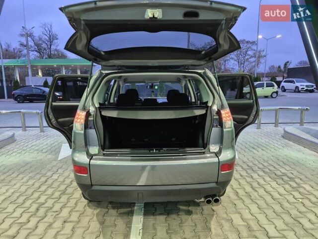 Серый Мицубиси Аутлендер ХЛ, объемом двигателя 2.2 л и пробегом 268 тыс. км за 8999 $, фото 75 на Automoto.ua