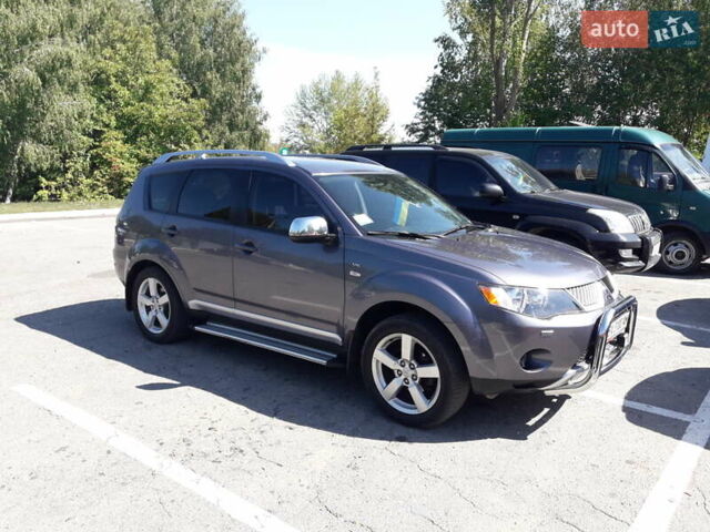 Серый Мицубиси Аутлендер ХЛ, объемом двигателя 3 л и пробегом 183 тыс. км за 10300 $, фото 7 на Automoto.ua