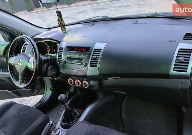 Серый Мицубиси Аутлендер ХЛ, объемом двигателя 2.2 л и пробегом 268 тыс. км за 8999 $, фото 59 на Automoto.ua