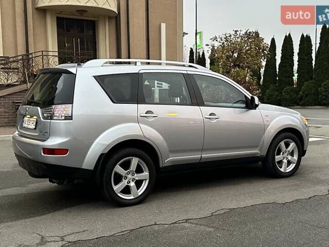 Серый Мицубиси Аутлендер ХЛ, объемом двигателя 3 л и пробегом 129 тыс. км за 10450 $, фото 18 на Automoto.ua