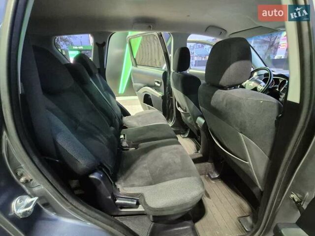 Серый Мицубиси Аутлендер ХЛ, объемом двигателя 2.2 л и пробегом 268 тыс. км за 8999 $, фото 64 на Automoto.ua