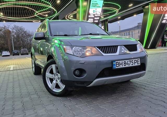 Серый Мицубиси Аутлендер ХЛ, объемом двигателя 2.2 л и пробегом 268 тыс. км за 8999 $, фото 87 на Automoto.ua