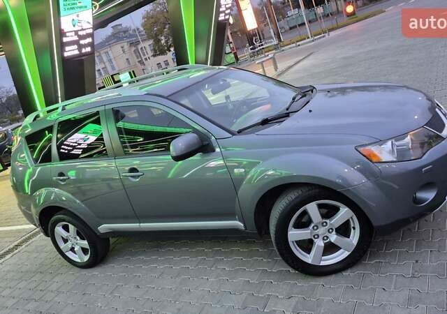 Серый Мицубиси Аутлендер ХЛ, объемом двигателя 2.2 л и пробегом 268 тыс. км за 8999 $, фото 60 на Automoto.ua