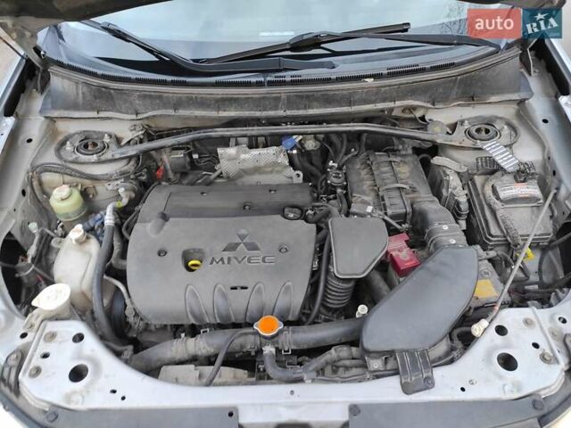 Сірий Міцубісі Аутлендер ХЛ, об'ємом двигуна 2.4 л та пробігом 307 тис. км за 8399 $, фото 57 на Automoto.ua